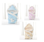 Newborn baby being hugged and swaddled by baby - Cindi Book