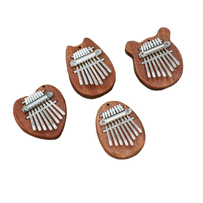 8-tone Mini Solid Wood Crystal Transparent Thumb Piano - Cindi Book