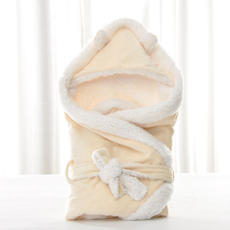 Newborn baby being hugged and swaddled by baby - Cindi Book