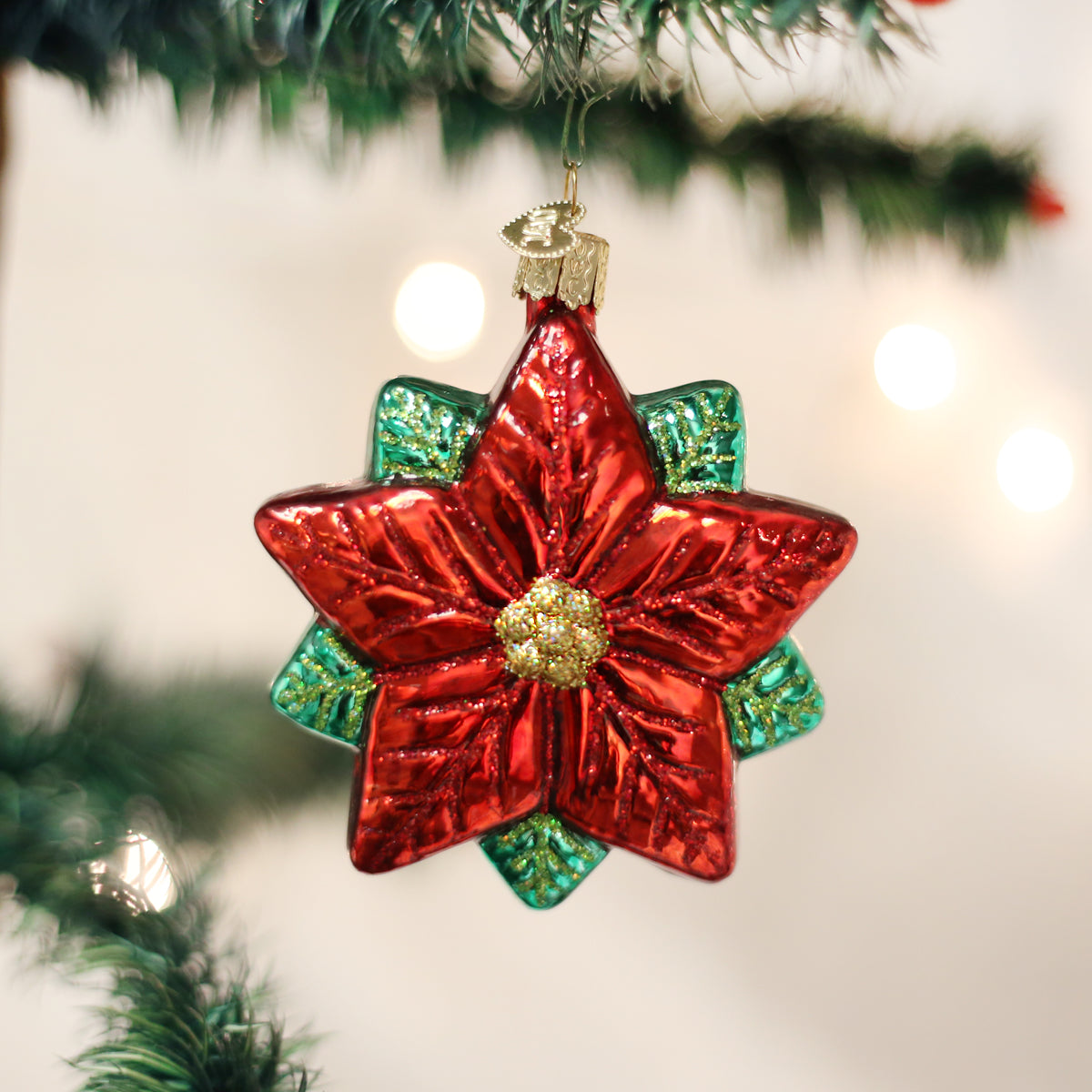 Old World Christmas Poinsettia Star Ornament - hand-blown glass Christmas tree ornament