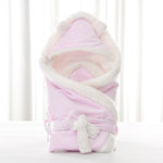 Newborn baby being hugged and swaddled by baby - Cindi Book