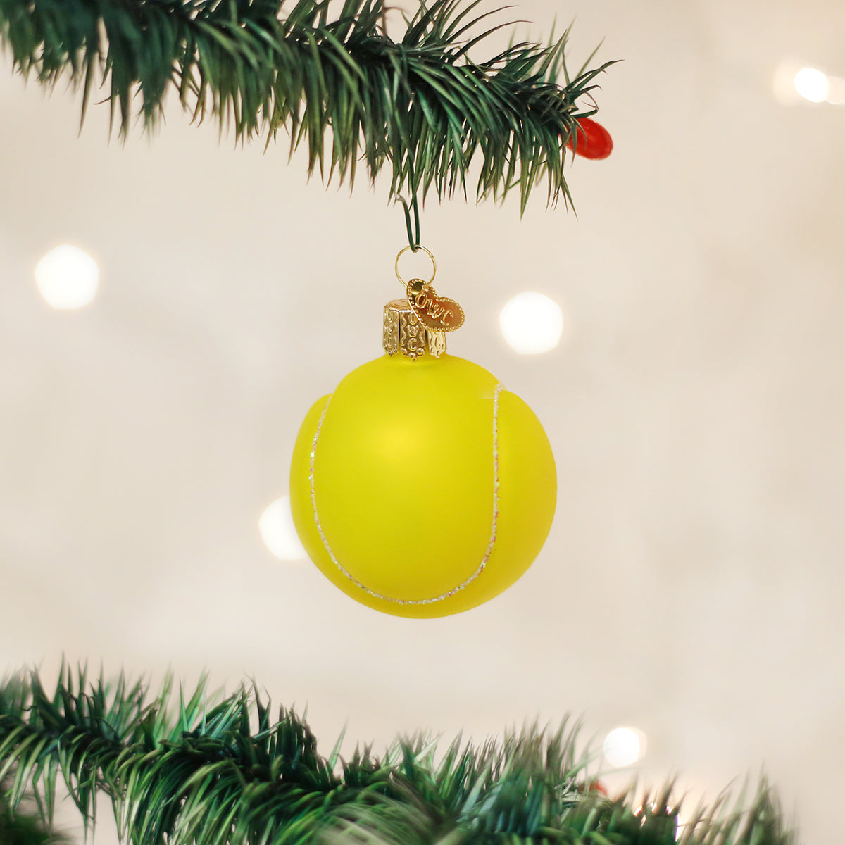 Old World Christmas Tennis Ball Ornament - hand-blown glass Christmas tree ornament