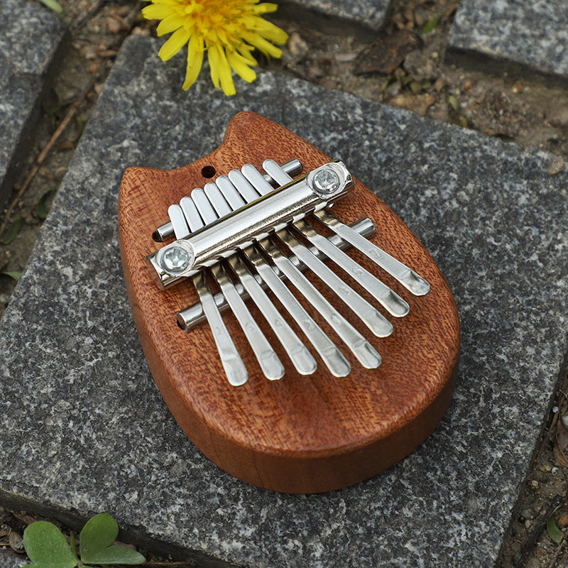 8-tone Mini Solid Wood Crystal Transparent Thumb Piano - Cindi Book