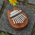8-tone Mini Solid Wood Crystal Transparent Thumb Piano - Cindi Book
