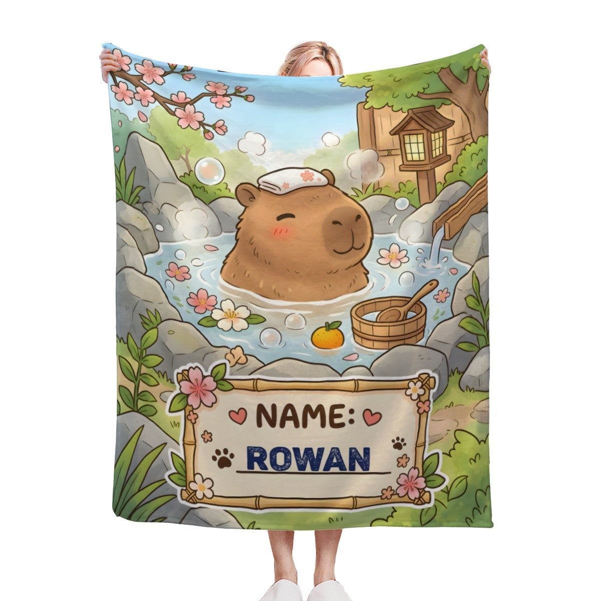 Personalized Capybara Hot Spring Blanket with Name | Kawaii Capybara in Japanese Onsen, Cherry Blossoms, Name on Bamboo Sign | Custom Gift for Capybara Lovers