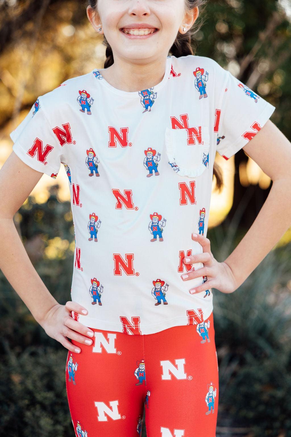 Nebraska White Herbie Husker Ruffle Pocket Tee - Image 6